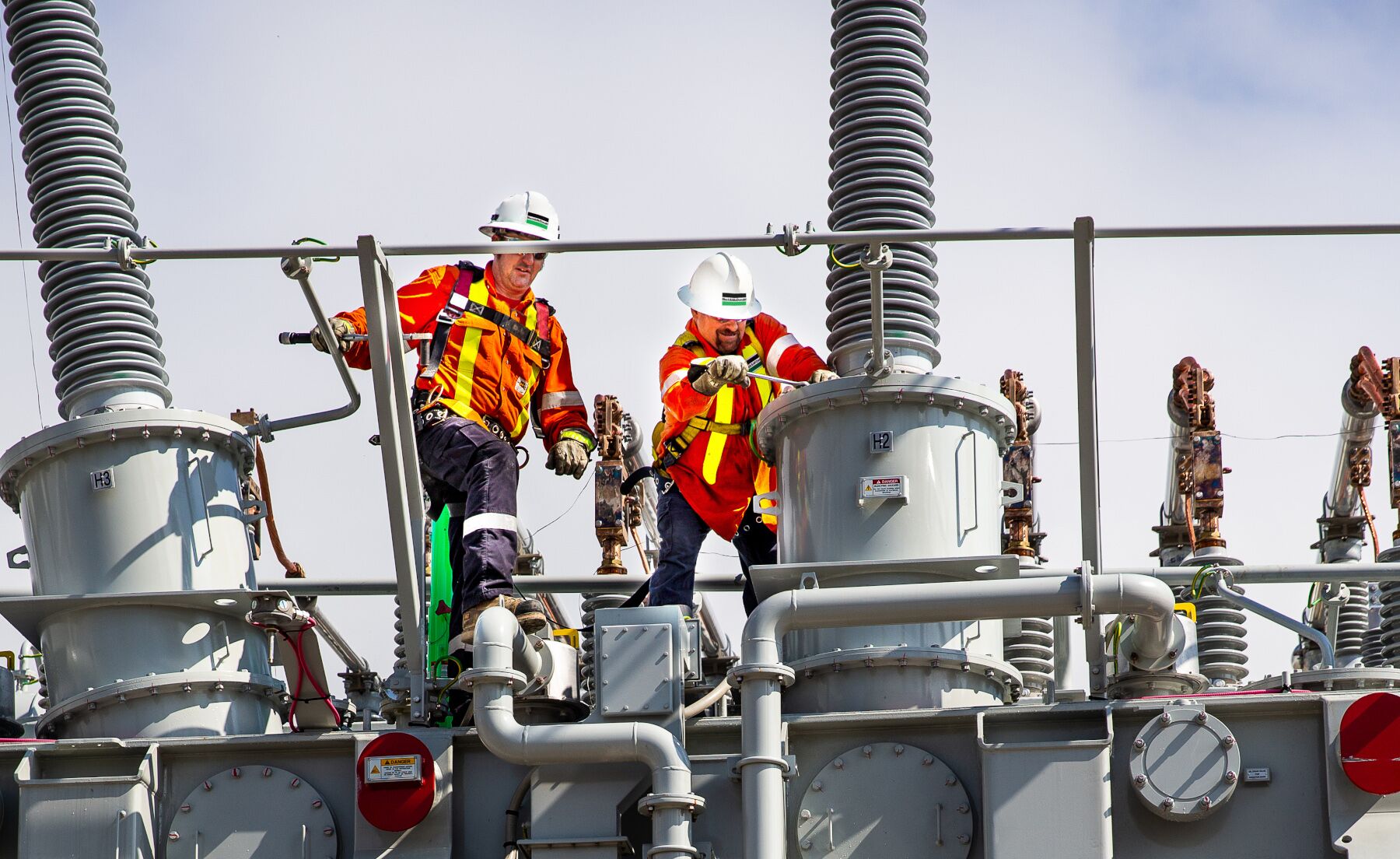 B&M electrician technician fixing a high voltage substation