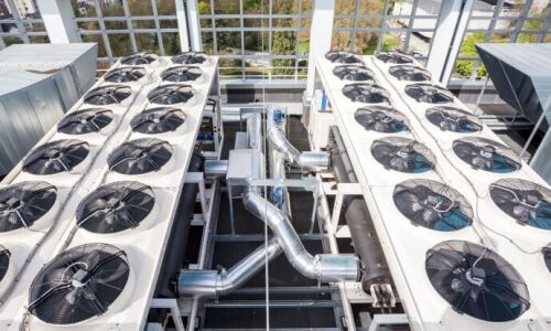 Rows of HVAC machines and piping.