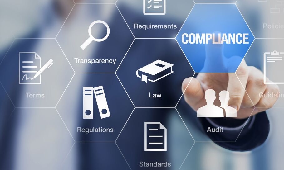 Compliance concept with businessman touching buttons on a virtual screen.