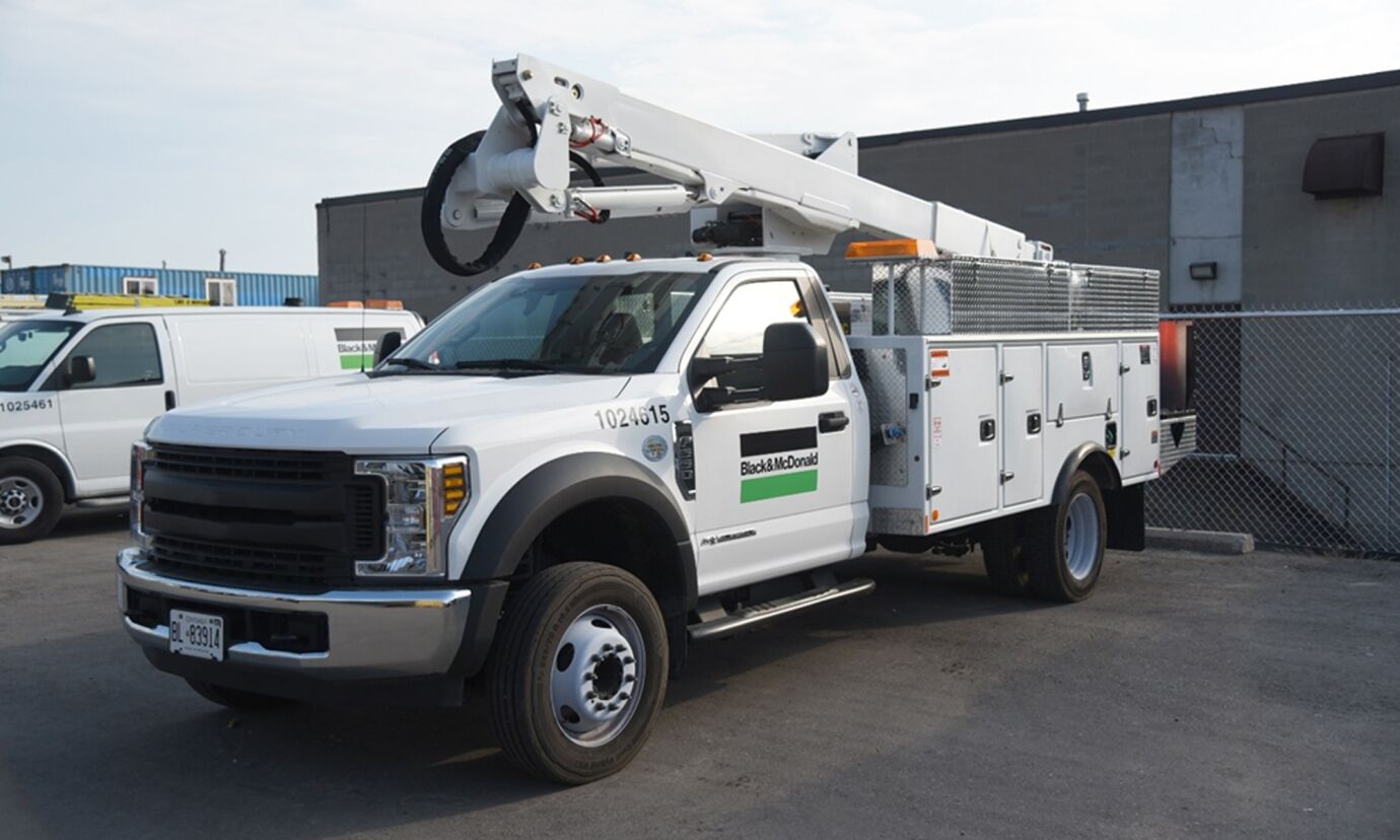 Black & McDonald’s Lift Truck used for traffic signal maintenance