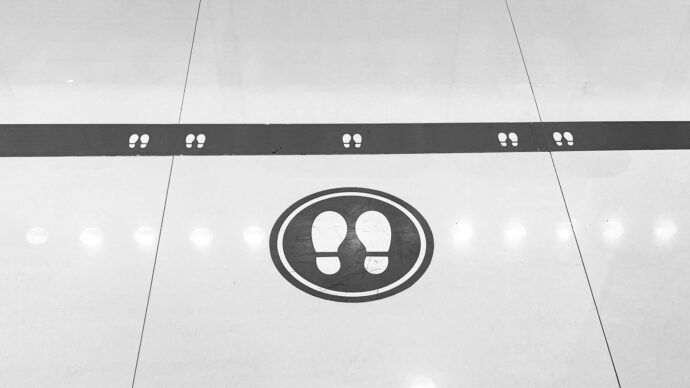 Social distancing signage put in place by Facility Managers during the COVID-19 Pandemic